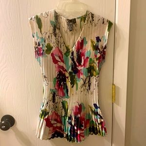 Milano floral print pleated blouse.